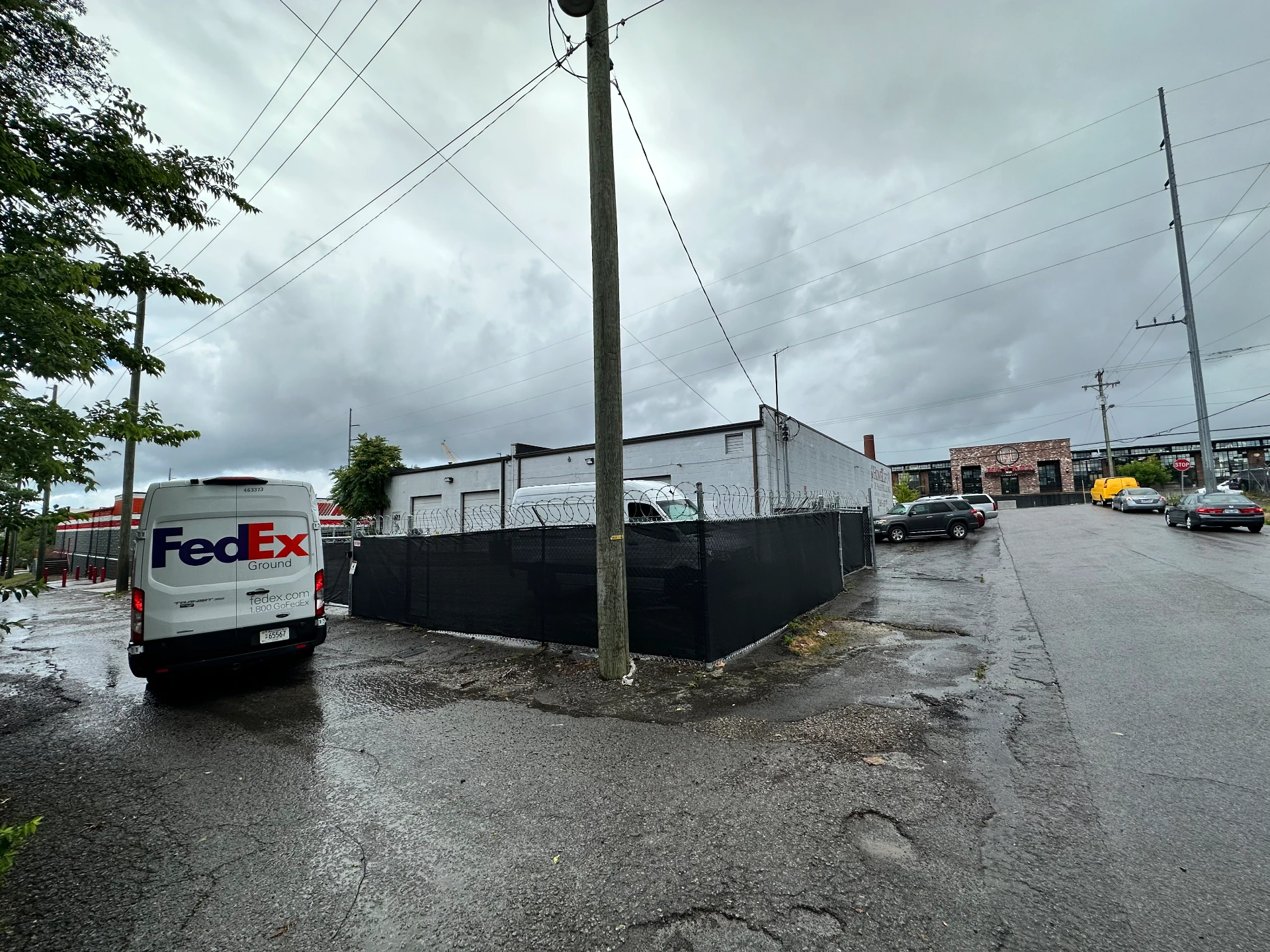 REAR EXTERIOR · GATED YARD W/ TWO AUTOMATIC GATES