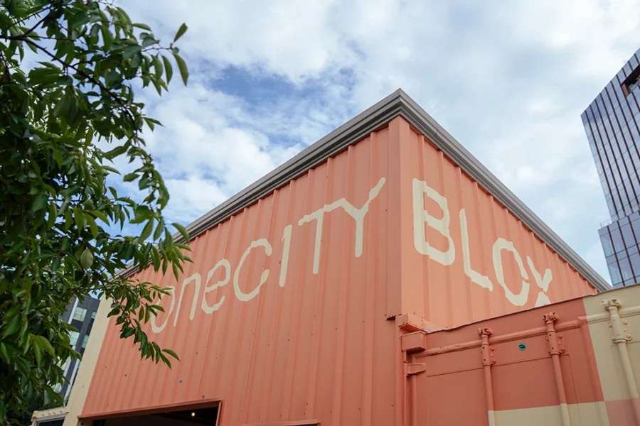 The colorful shipping-container storefronts at oneC1ty Blox